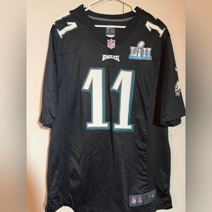 NFL Black Eagles Jersey with White and Teal Accents